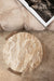 PTMD Nubibus beige polyester 3-zitsbank met ronde marmeren bijzettafel in een modern interieur.