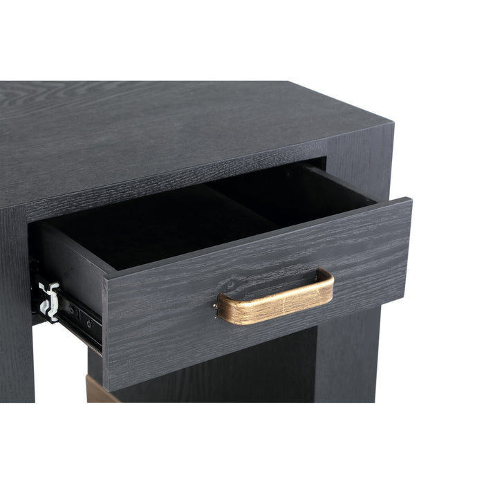 Zwarte PTMD Tiess bijzettafel van houtfineer met een opengeschoven lade en een goudkleurige handgreep.