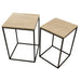 Twee beige Volos bijzettafels van natuursteen met een slank zwart metalen frame op een witte achtergrond.