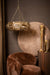 Goudkleurige PTMD hanglamp van glas met een geometrisch design, afmeting 70x70x21 cm, hangend in een stijlvol interieur.