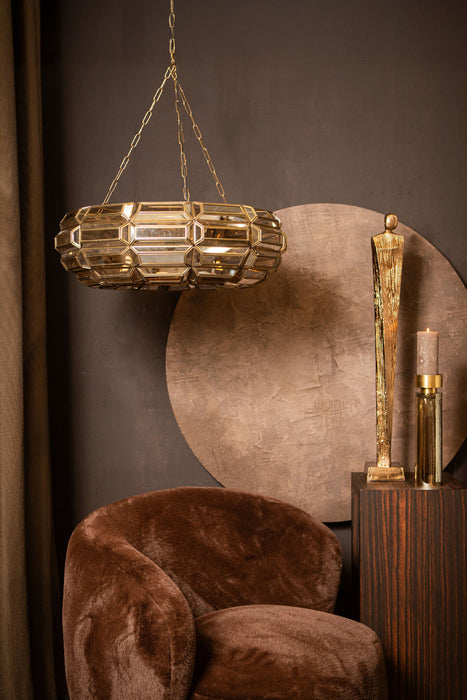 Goudkleurige PTMD hanglamp van 70x70x21 cm met facetgeslepen glas in een luxe, decoratief interieur.
