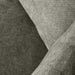 Close-up van de zachte, hunter groene chenille bekleding van de LABEL51 Milano hoekbank met textuurdetails.