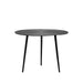LABEL51 Nobby ronde salontafel van 60 cm in zwart metaal met een gestructureerd tafelblad en drie slanke poten.