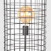 LABEL51 Solido vloerlamp van zwart metaal met een industrieel rasterontwerp en een sfeervolle led-lichtbron.
