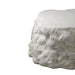 Witte PTMD Haride salontafel van beton met een organische, robuuste rotsstructuur en een glad tafelblad.