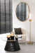 Elegante vloerlamp met transparante glazen kap en goudkleurige voet, 155 cm hoog in een modern interieur.